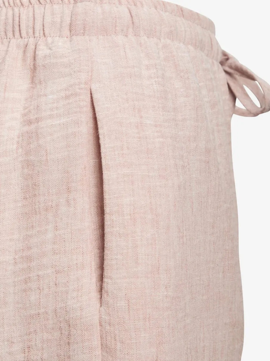 Pantalon ample avec ceinture et manches courtes en matière légère