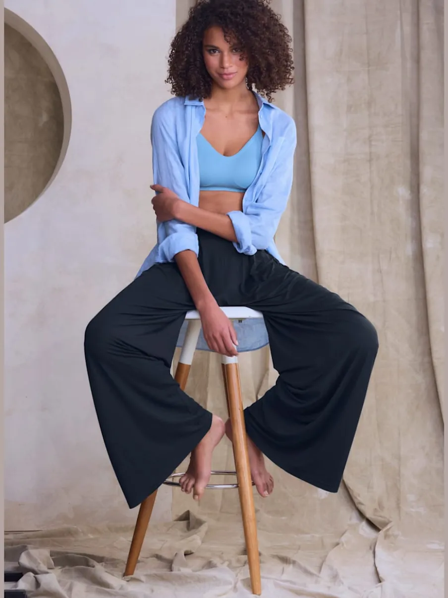 Pantalon ample doux avec pinces et poches latérales