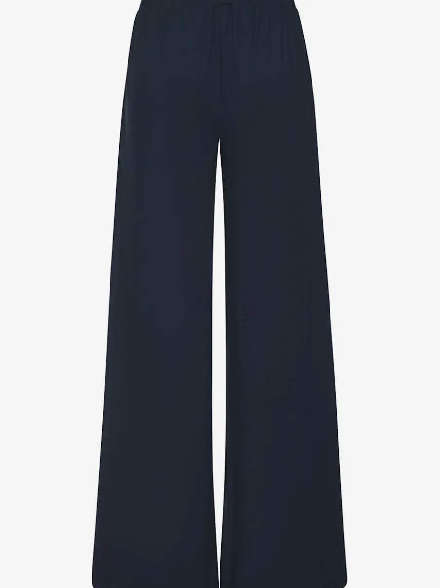 Pantalon ample doux avec pinces et poches latérales