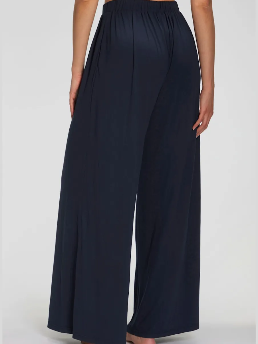 Pantalon ample doux avec pinces et poches latérales