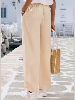 Pantalon ample à poches fendues avec ceinture à cordon