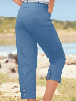 Pantalon 7/8 avec ceinture et fente arrondie deux boutons