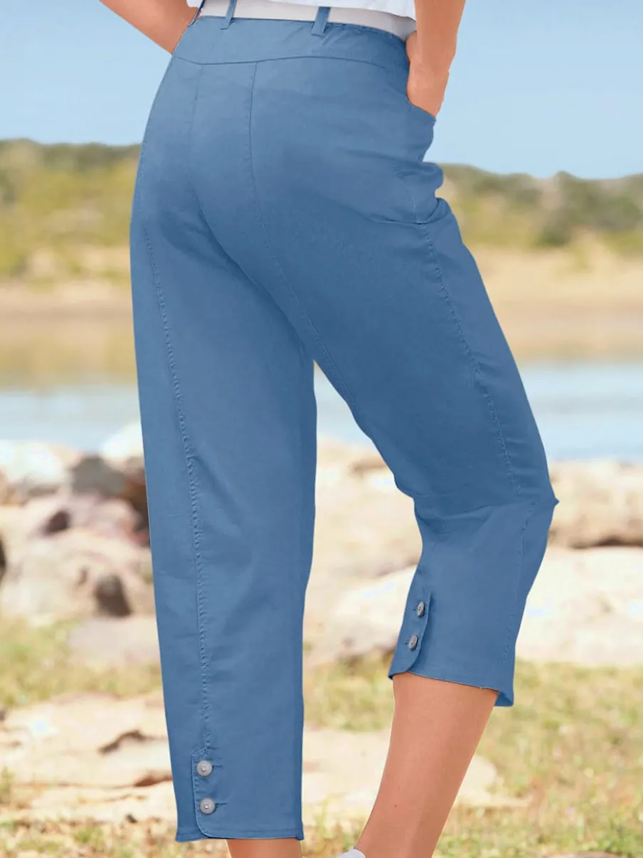 Pantalon 7/8 avec ceinture et fente arrondie deux boutons