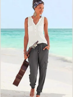 Pantalon avec ceinture smockée et poches cargo latérales