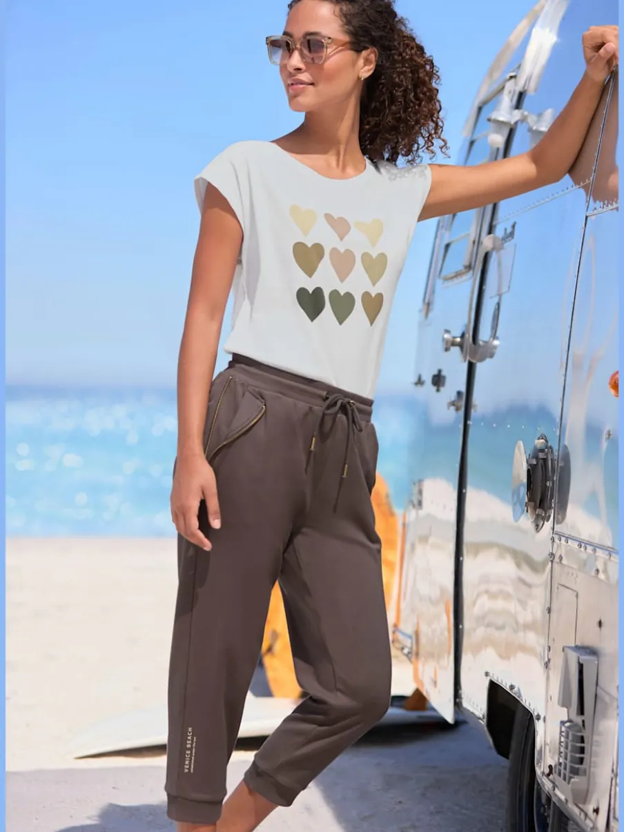 Pantalon 7/8 avec cordon et poches zippées pratiques
