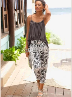 Pantalon 7/8 avec imprimé floral et poches latérales