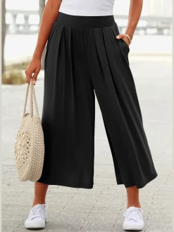 Pantalon avec large ceinture élastique et poches.