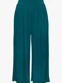 Pantalon avec large ceinture élastique et poches.