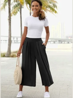 Pantalon avec large ceinture élastique et poches.