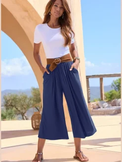 Pantalon avec large ceinture élastique et poches.