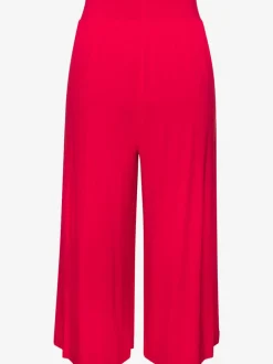 Pantalon avec large ceinture élastique et poches.