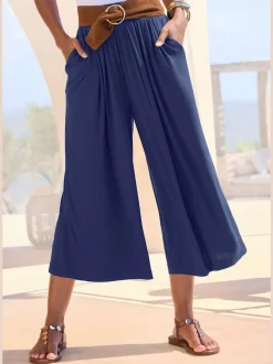 Pantalon avec large ceinture élastique et poches.