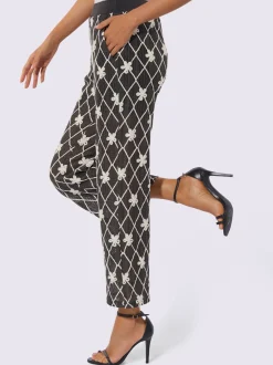 Pantalon avec motifs losanges et fleurs à ceinture élastique