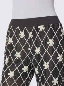 Pantalon avec motifs losanges et fleurs à ceinture élastique