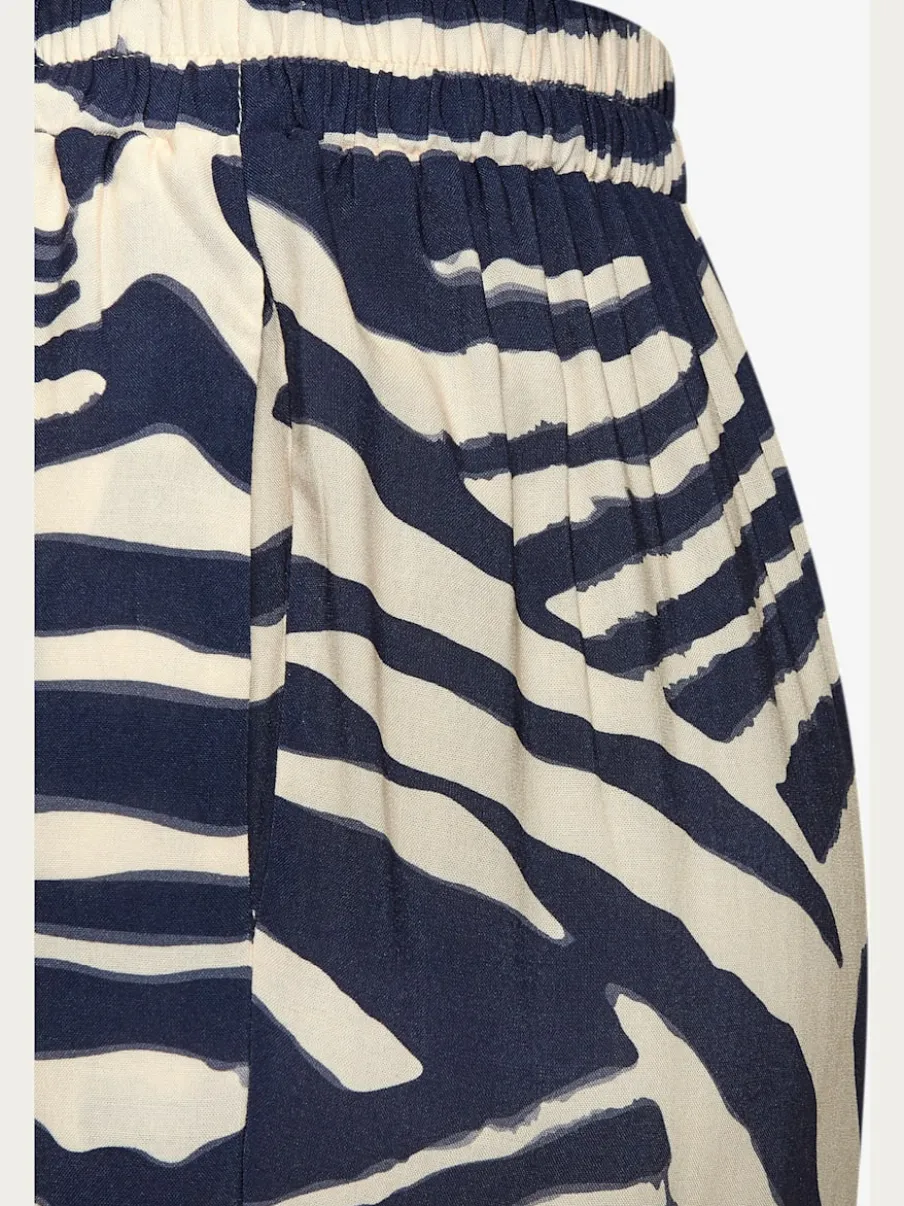 Pantalon avec poches latérales et imprimé animal chic