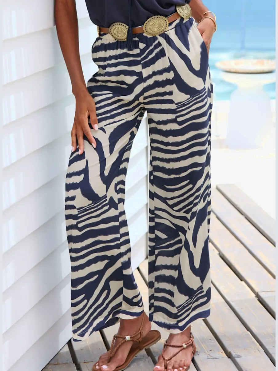 Pantalon avec poches latérales et imprimé animal chic