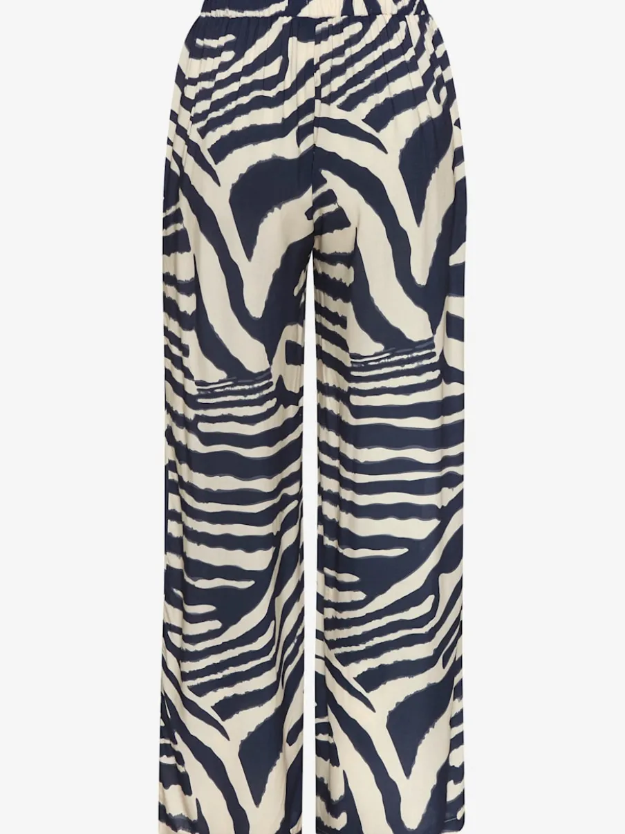 Pantalon avec poches latérales et imprimé animal chic
