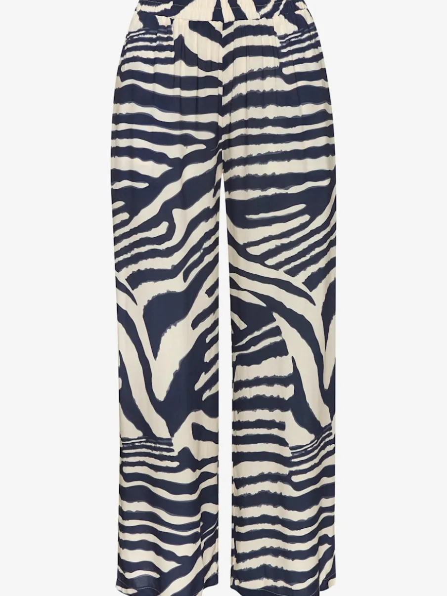 Pantalon avec poches latérales et imprimé animal chic