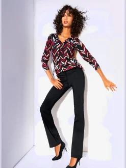 Pantalon bootcut en tissu extensible avec effet ventre plat