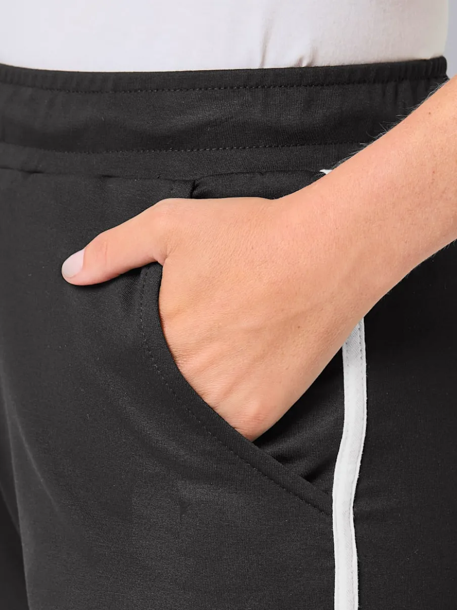 Pantalon à ceinture élastique en sweat avec poches latérales