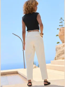 Pantalon à ceinture étroite avec poches fendues et jambes étroites