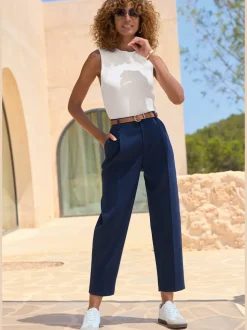 Pantalon à ceinture étroite avec poches fendues et jambes étroites