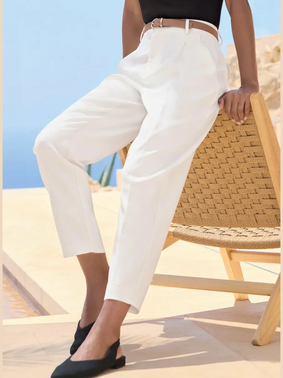 Pantalon à ceinture étroite avec poches fendues et jambes étroites