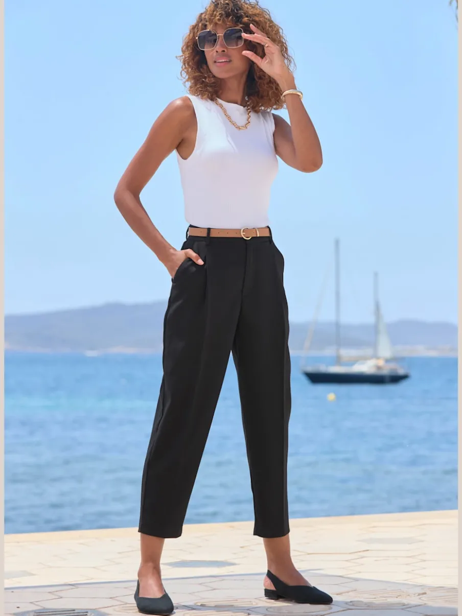 Pantalon à ceinture étroite avec poches fendues et jambes étroites
