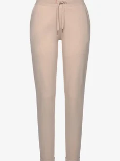 Pantalon confortable avec poches fendues et ourlet à revers