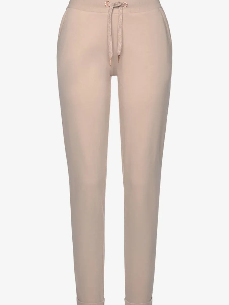 Pantalon confortable avec poches fendues et ourlet à revers