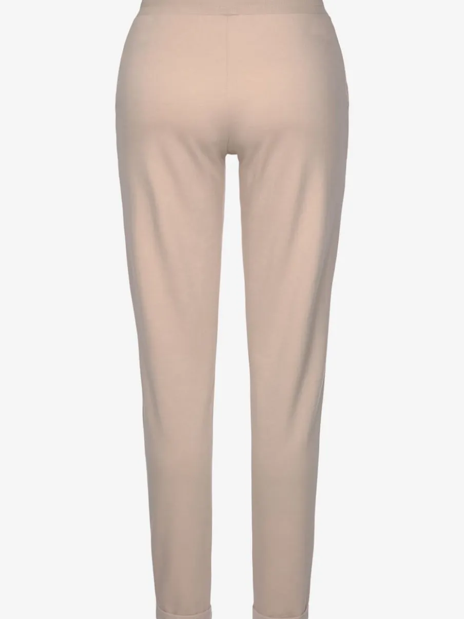 Pantalon confortable avec poches fendues et ourlet à revers