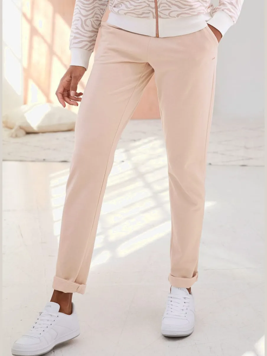 Pantalon confortable avec poches fendues et ourlet à revers