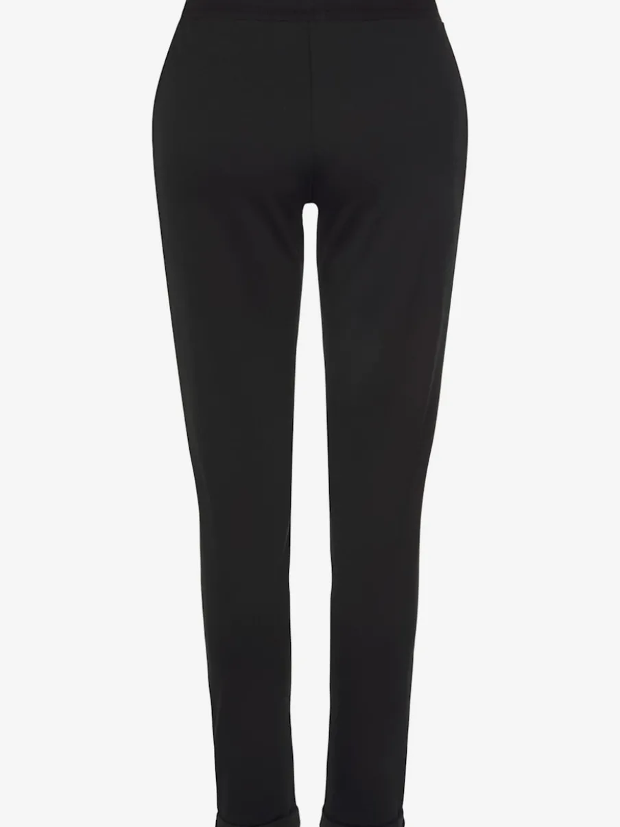 Pantalon confortable avec poches fendues et ourlet à revers