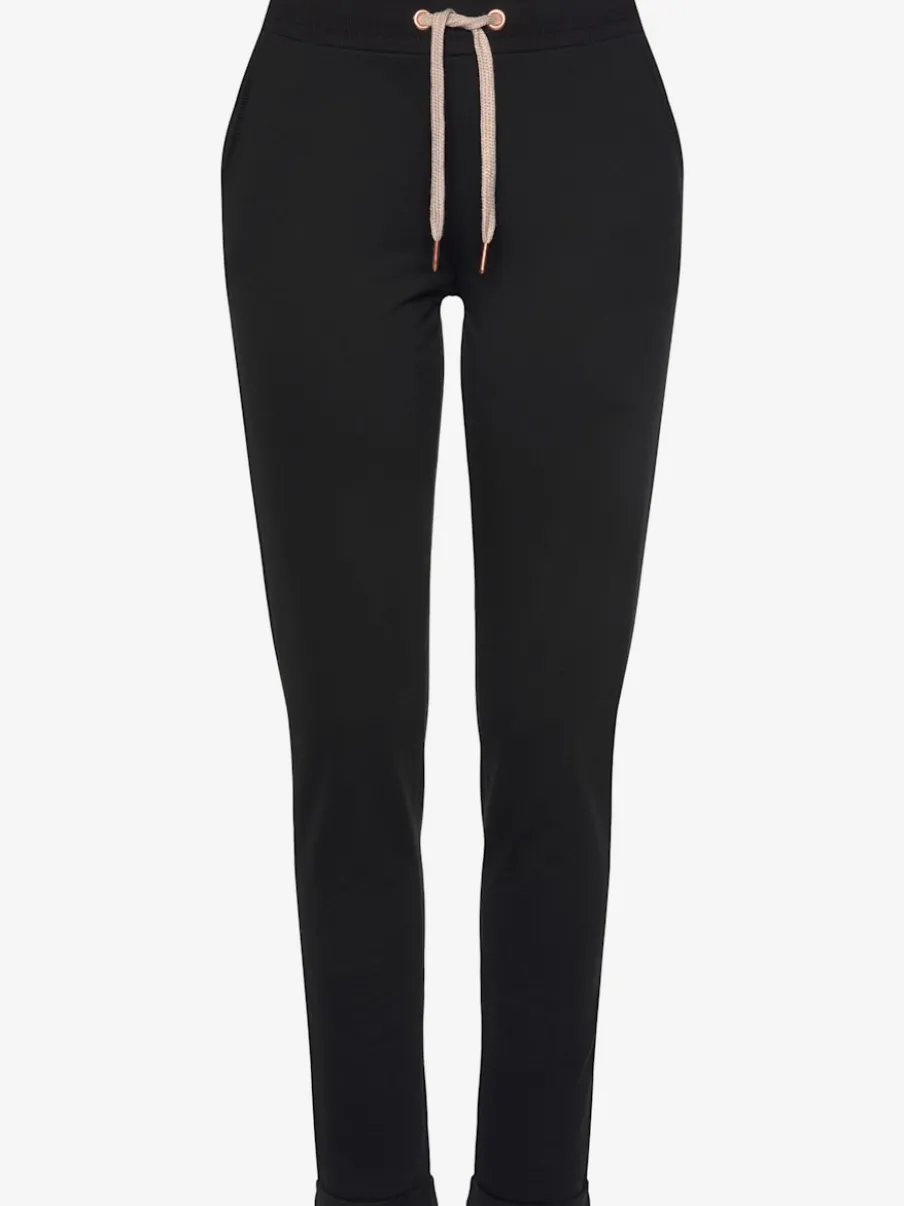 Pantalon confortable avec poches fendues et ourlet à revers