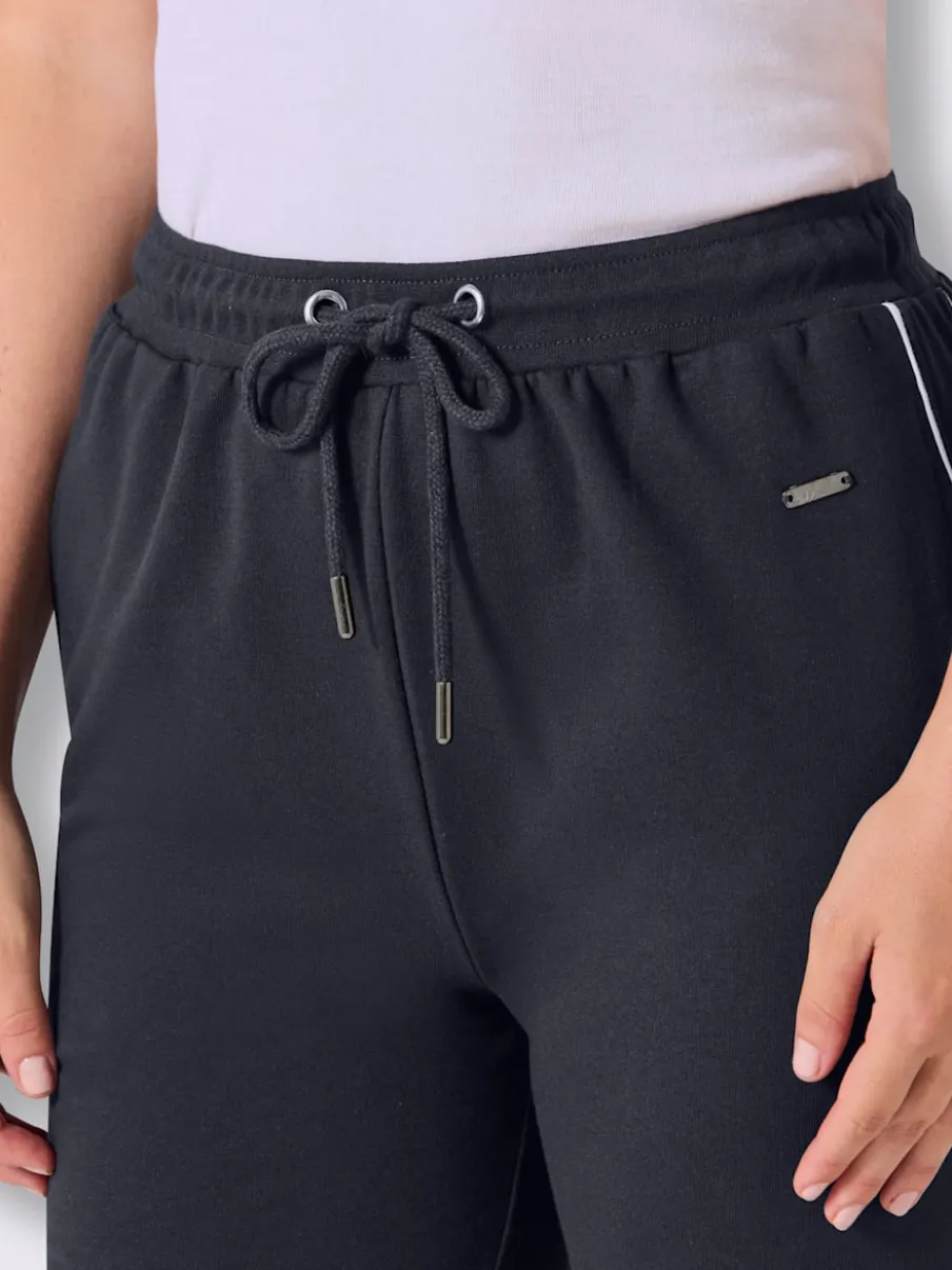 Pantalon court en matière sweat avec passepoil double sportif et ceinture élastique
