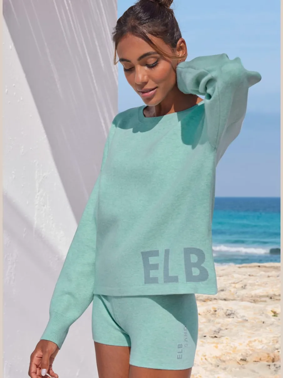 Pantalon court en tricot doux avec logo brodé et finition agréable