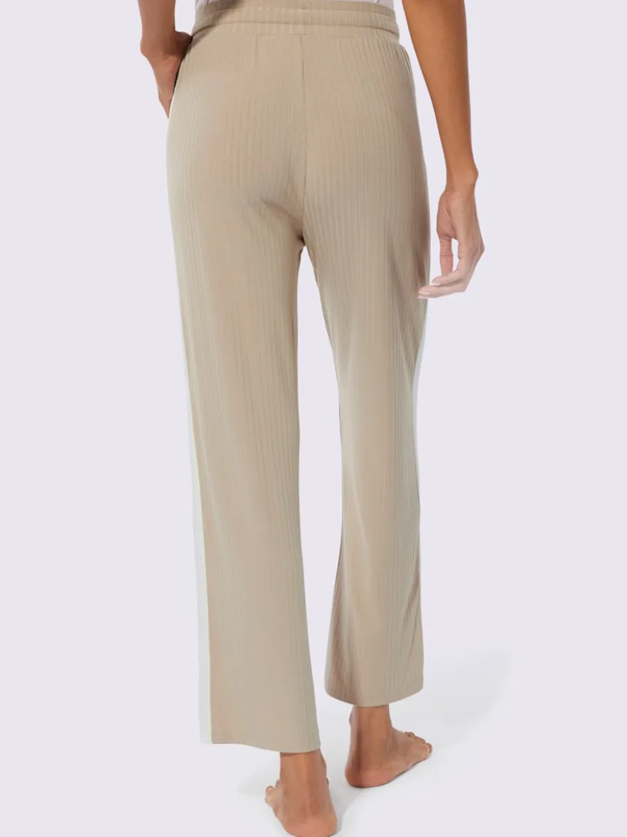 Pantalon côtelé confortable avec ceinture élastique et empiècements sportifs
