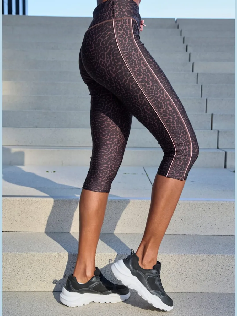 Pantalon de sport corsaire avec imprimé léopard et passepoils contrastés