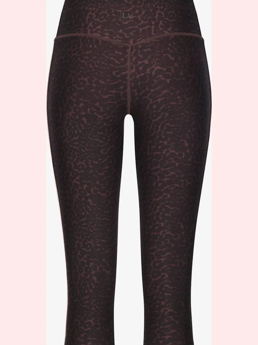 Pantalon de sport corsaire avec imprimé léopard et passepoils contrastés