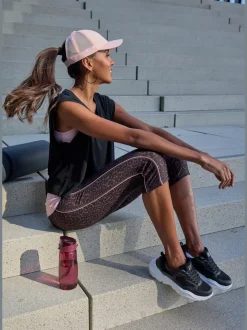 Pantalon de sport corsaire avec imprimé léopard et passepoils contrastés