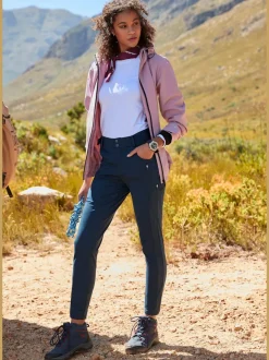 Pantalon de trekking ajusté avec poches zippées pratiques