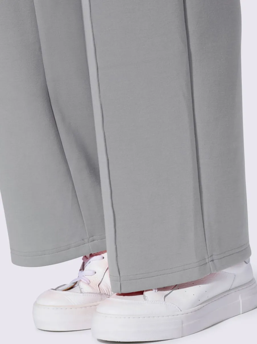 Pantalon droit en sweat avec ceinture élastique et poches
