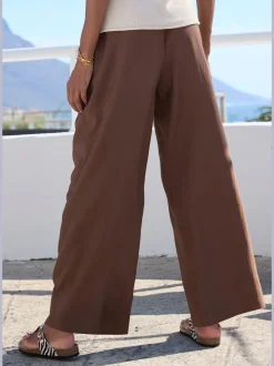 Pantalon d'été chic avec pinces et poches latérales