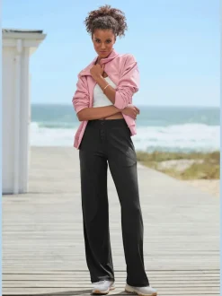Pantalon détente en matière douce avec jambes droites et patte de boutonnage