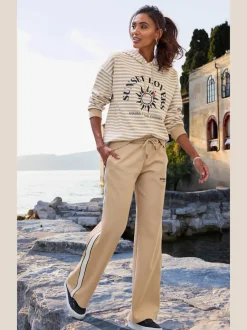 Pantalon détente large avec ceinture élastique et rayures latérales