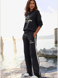 Pantalon détente large avec ceinture élastique et rayures latérales