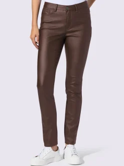 Pantalon effet ventre plat avec coupe skinny et brillance raffinée