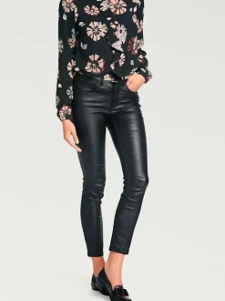 Pantalon effet ventre plat avec coupe skinny et brillance raffinée