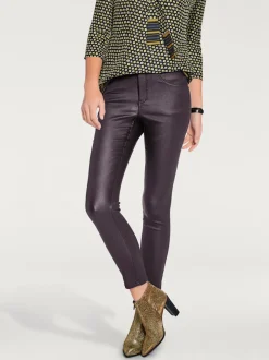 Pantalon effet ventre plat avec coupe skinny et brillance raffinée