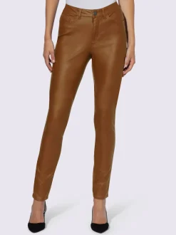 Pantalon effet ventre plat avec coupe skinny et brillance raffinée